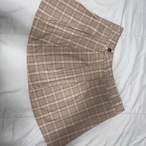 Tan and white plaid skirt